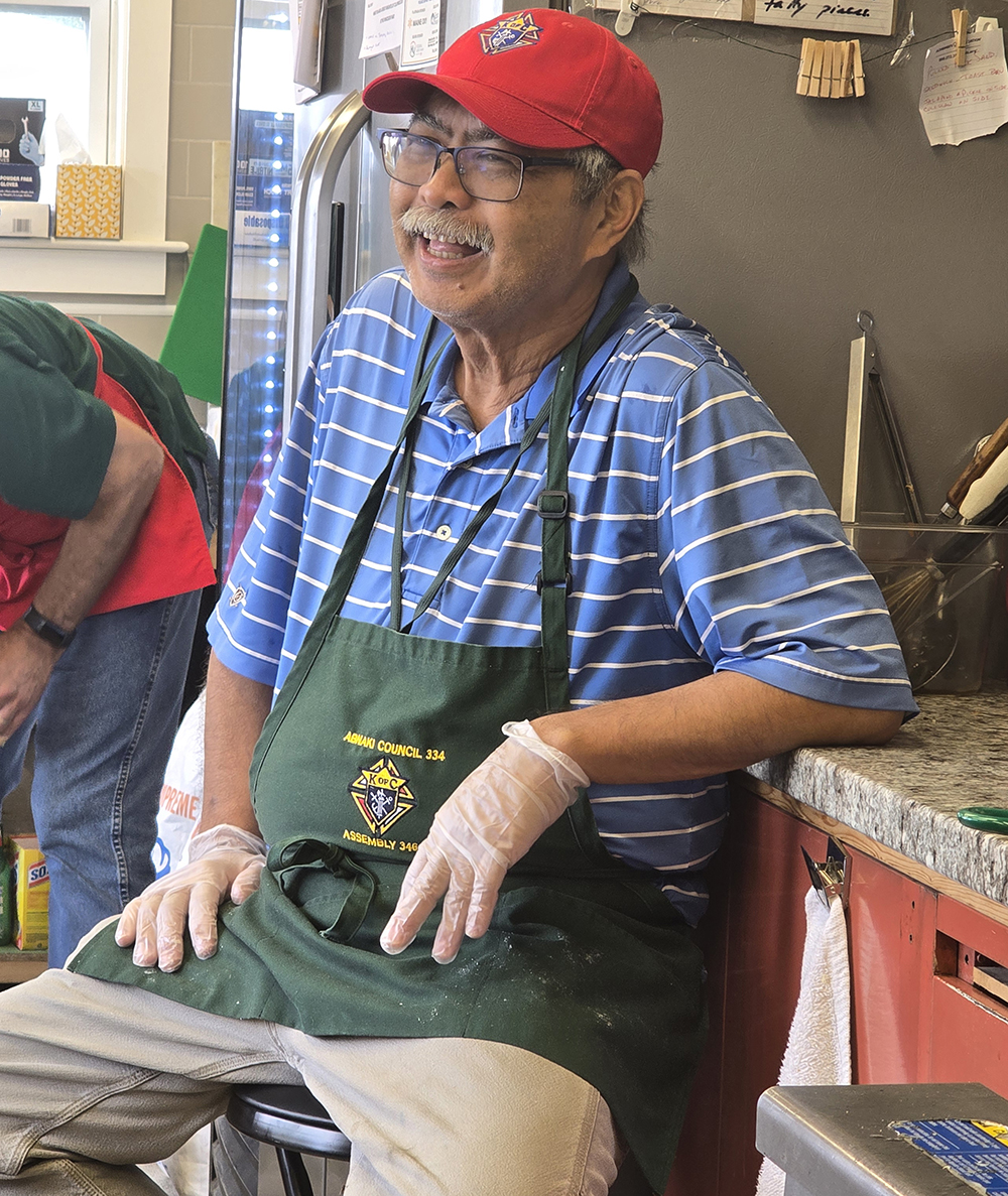Image of Vic
	at the Knights' Windsor Fair booth