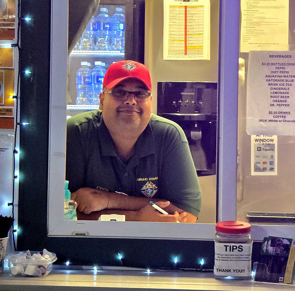 Image of Chris at the Knights' Windsor Fair booth
